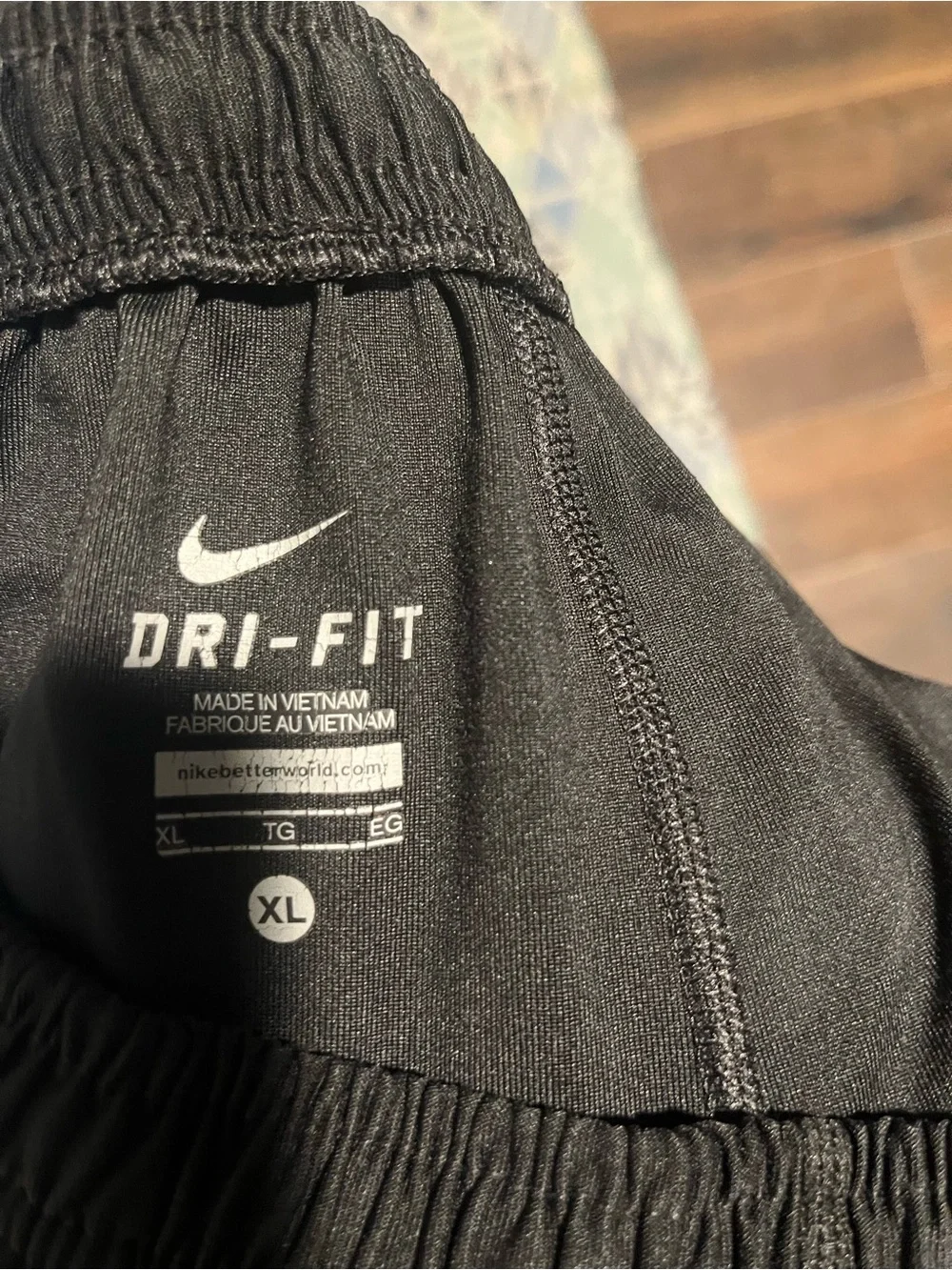 Nike Black Track Pants with White Swoosh and Ankle Zips